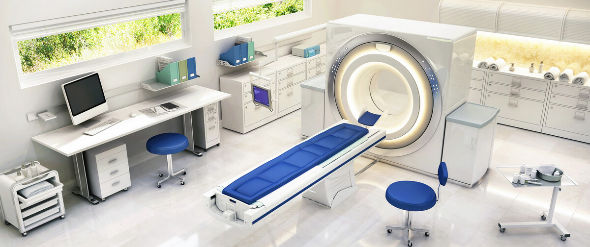 Interior of an MRI shielded room showing installed Faraday cage panels and RF door